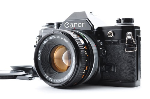 Canon noir objectif - ae-1, /